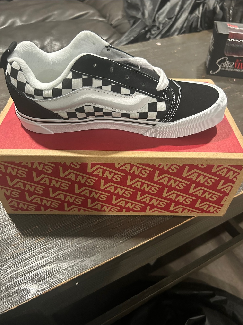 Vans Knu Skool Checkerboard sneakers, featuring a bold black-and-white